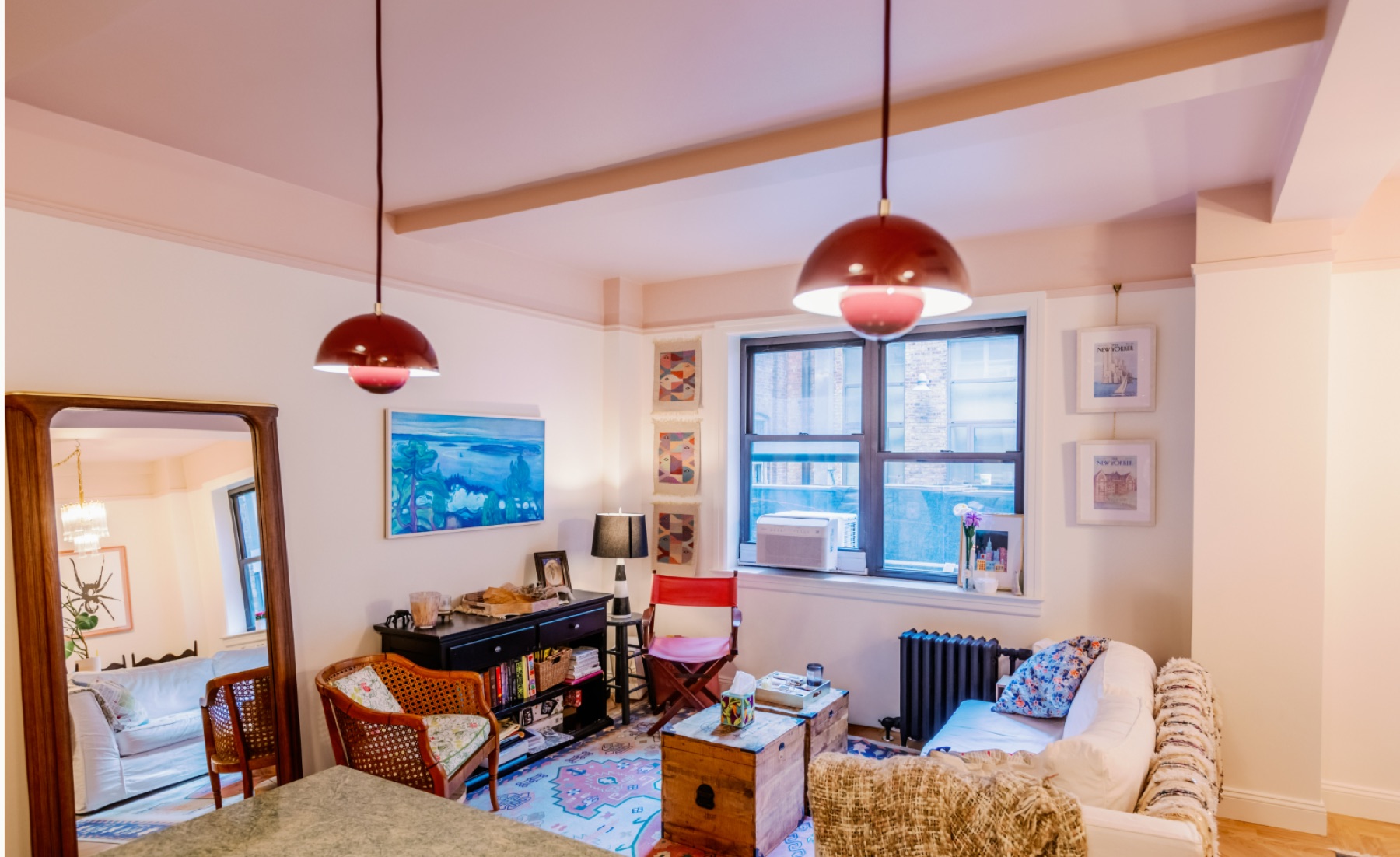 210 West 78th St full remodeling living room with red pendant lights and custom finishes