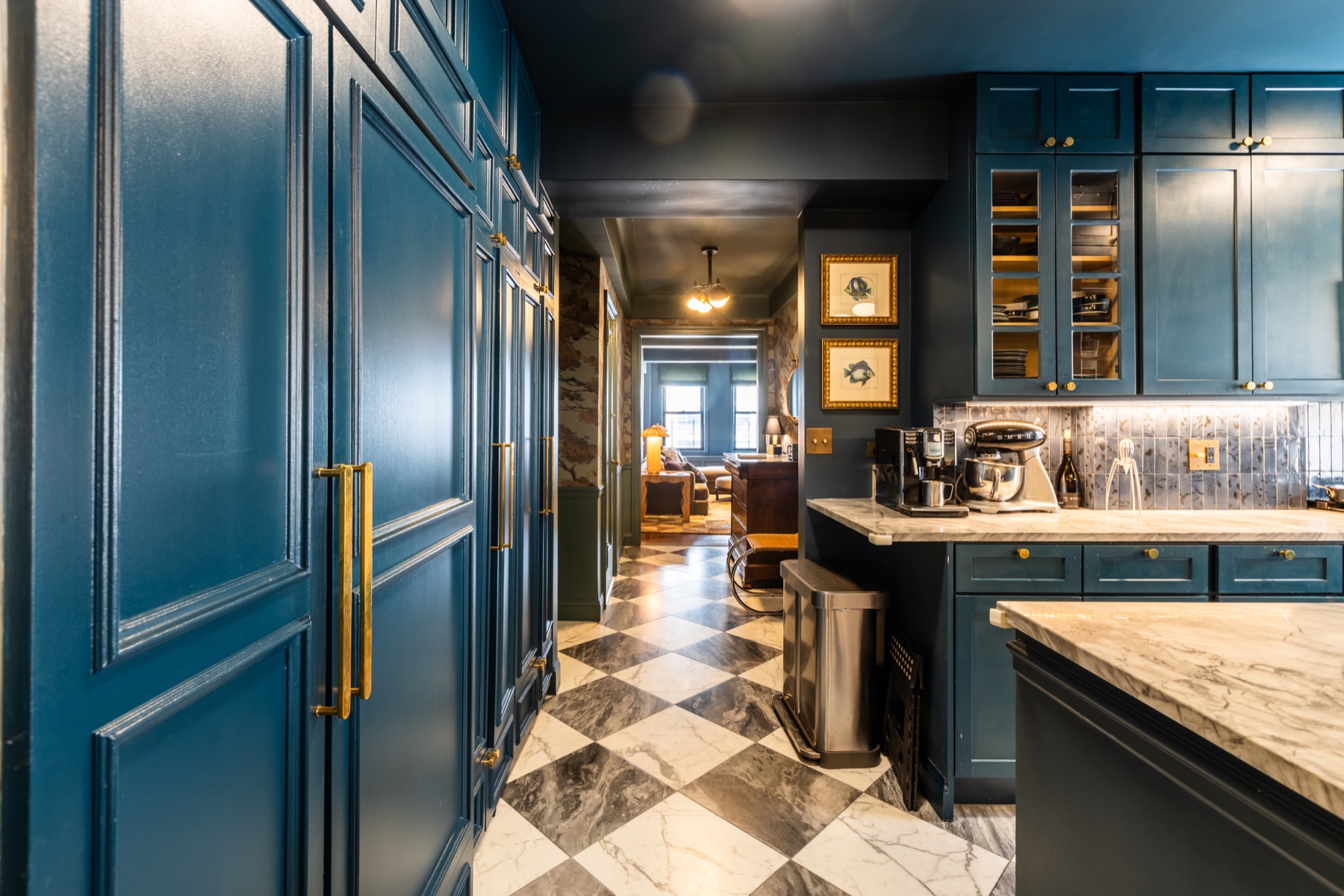 308 East 79th St full remodeling blue kitchen with brass hardware and checker marble flooring